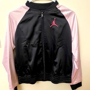 Jordan’s pink and black bomber jacket